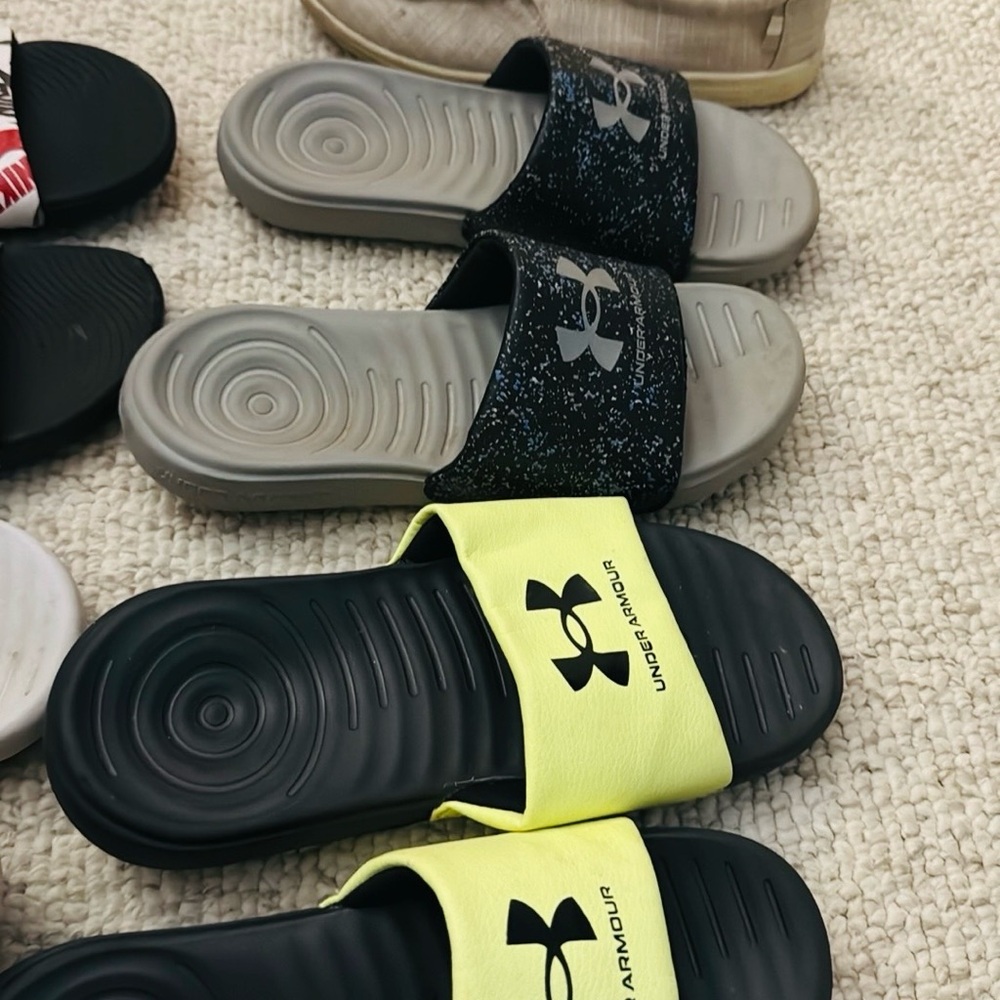 2 Under Armour Slides with a canvas tan slip on shoe cat and jack size 4